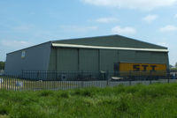 X3HK Airport - one of the two surviving Pentad Hangar at the former RNAS Hinstock, also known as: HMS Godwit / No 21 SLG / RAF Ollerton . In use between 17 October 1941 and 28 February 1947 - by Chris Hall