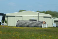 X3HK Airport - one of the two surviving Pentad Hangar at the former RNAS Hinstock, also known as: HMS Godwit / No 21 SLG / RAF Ollerton . In use between 17 October 1941 and 28 February 1947 - by Chris Hall