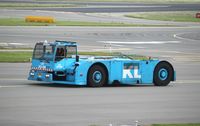 Amsterdam Schiphol Airport, Haarlemmermeer, near Amsterdam Netherlands (EHAM) - Aircraft Tug - by Mark Pasqualino