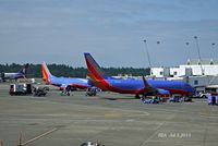 Seattle-tacoma International Airport (SEA) - Southwest at the gate - by metricbolt