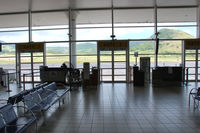 Robert L. Bradshaw International Airport - Departure hall with its three gates - by Tomas Milosch