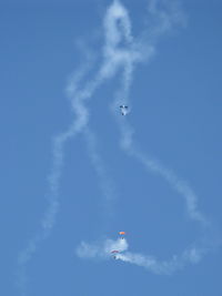 Camarillo Airport (CMA) - Three parachutists doing stunts with smoke opening the Wings Over Camarillo Airshow 2013 - by Doug Robertson
