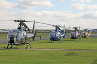 EGBR Airport - Gazelles at The Real Aeroplane Club's Helicopter Fly-In at Breighton Airfield, September 22 2013. N505HA, HA-LFQ, G-LOYD & HA-LFH. - by Malcolm Clarke