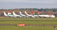Bournemouth Airport, Bournemouth, England United Kingdom (EGHH) - Line up of stored B737s includes the 2 Azman Air Nigeria soon to be delivered and the 6 designated for the ill-fated Solyom Hungarian Airways. - by John Coates