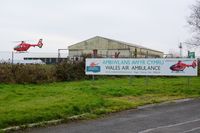 Swansea Airport, Swansea, Wales United Kingdom (EGFH) - Wales Air Ambulance helicopter (Helimed 57) leaving base responding to an emergency. - by Roger Winser
