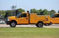 Wittman Regional Airport (OSH) - Airport Service Truck - by Mark Pasqualino