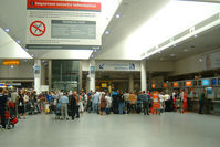 London Gatwick Airport - Hustle and Bustle at a  departure gate at London's Gatwick Airport - by Ron Coates