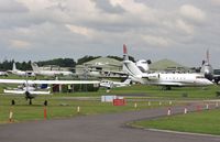 Kemble Airport, Kemble, England United Kingdom (EGBP) - Busy Kemble with M-NINE and G-LWDC - by John Coates