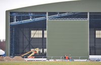 Bournemouth Airport, Bournemouth, England United Kingdom (EGHH) - Hangar for expected B748BBJ progressing well - by John Coates