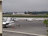 Oxnard Airport (OXR) - Unusually occupied GA ramp because nearby Camarillo CMA's sole runway is closed for maintenance. CMA tower diverting aircraft to OXR with some CMA-based aircraft departing early to OXR before the closure - by Doug Robertson