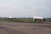 London Heathrow Airport, London, England United Kingdom (EGLL) - American Airlines Boeing 777-200 & British Airways Boeing 747-400 - by Hannes Tenkrat