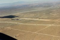 Crystal Airport (46CN) - Difficult to see but its next to the housing development and the dark area. View is northeast. - by S B J