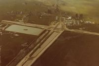 Sonoma Valley Airport (0Q3) - Schellville in early 1984 when it still had the (nice) dirt runways.The water between the runway and taxiway made it very interesting! Was not a good place to groundloop. - by S B J