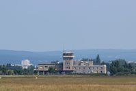 Dijon-Longvic Airbase - View of air force base tower (BA-102) from the east. In the background, the city of Dijon. - by Thierry BEYL