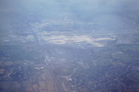 London Gatwick Airport - From scanned slide taken early September 1990 from departing NorthWest Airlines flight to MSP.  View shows airport from the north about 15k altitude and climbing. - by Neil Henry