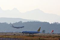 Vancouver International Airport, Vancouver, British Columbia Canada (YVR) - Condor D-ABUM to FRA,CAL B-18801 arriving from TPE - by metricbolt