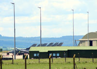RAF Lossiemouth Airport, Lossiemouth, Scotland United Kingdom (EGQS) - Close-up of 15R Sqn buildings with a row of Tornado GR.4 at RAF Lossiemouth EGQS - by Clive Pattle