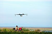 Vancouver International Airport, Vancouver, British Columbia Canada (YVR) - Enjoying the sea breeze and watching the seaplanes. - by metricbolt