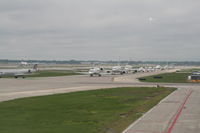 Chicago O'hare International Airport (ORD) - Queuing on the taxiway to take off - by Daniel Vanderauwera