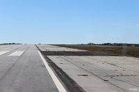 SFAL Airport - A darkened area of tarmac on the edge of the main runway at Port Stanley (SFAL) clearly shows where repairs were made following the Vulcan Black Buck bombing in May 1982.  - by Clive Pattle