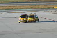 Málaga Airport - Two Follow Me vehicles having a chat.  - by Guitarist