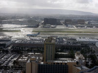 Los Angeles International Airport (LAX) - I thought it never rains in Southern California...(taken from N831UA, SFO-LAX) - by Micha Lueck