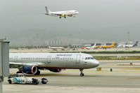 Barcelona International Airport - View thru terminal window to northern runway..... - by Holger Zengler