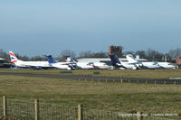 Cranfield Airport, Cranfield, England United Kingdom (EGTC) - four BAe 146's and a B737 in storage at Cranfield - by Chris Hall