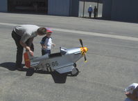 Santa Paula Airport (SZP) - P-51 MUSTANG Pedal Plane, 3-4 year old power, preflight assist by Builder Dad. NOTE: All upload dates were wrongly changed-these four photos were uploaded on the shot date-hence the many views each. - by Doug Robertson