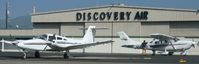 Reid-hillview Of Santa Clara County Airport (RHV) - The Discovery Air hangar with one of Nice Air's Piper Seneca's and Discovery Air's Cessna 206s. - by Chris L.
