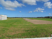 Ruawai Aerodrome - Grass strip with possibly crushed lime base. - by magnaman