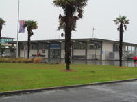 Whangarei Airport - Terminal on a wet and blustery day - by magnaman