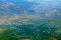 Tunggul Wulung Airport - Carson City is seen near mts.Dirt crosswind runway(seen best) was welcome on one arrival with gusty 35kt winds with 5-10 seconds of dead calm mixed in .Nasty stuff but the dirt runway was perfectly aligned for my Tcraft.View is north. - by S B J