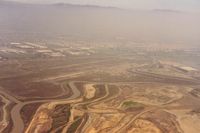 Q59 Airport - Fremont,Ca closed in 1986.Most pilots who flew out of Fremont and there were many, will find this picture a familiar sight. It is on the 45 entry to runway 31 and over the landfill. Over the dumps, was an often heard unicom call.View is to the east. - by S B J