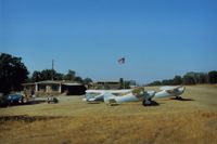 NONE Airport - Robbins Airport near  Lake Comanche,Ca.is a private strip.View is to the west and the 1st annual Chief ( and only one) fly in in progress.If open to the public (its not) the 1500 foot runway might need a net at the end to catch sunday pilots. - by S B J