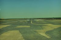 New Jerusalem Airport (1Q4) - View down runway 12.At one point the FAA said the threshold was to near an existing irrigation ditch, so airport was closed.Somebody came up with the idea of moving threshold  down 300 feet as seen. FAA happy and airport reopened. - by S B J