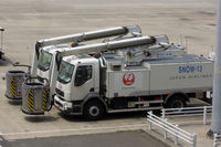 Tokyo International Airport (Haneda), Ota, Tokyo Japan (RJTT) - De-icing trucks parked for the summer - by Micha Lueck