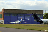 Cranfield Airport, Cranfield, England United Kingdom (EGTC) - Hangar view from airside at Cranfield EGTC - by Clive Pattle