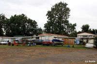 Peterborough/Sibson Airport, Peterborough, England United Kingdom (EGSP) - The shanty town area at the rear of the airfield at Sibson EGSP, used for temp accom for parachutists, skydivers and their families. - by Clive Pattle