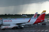 Düsseldorf International Airport, Düsseldorf Germany (EDDL) - View on two aircrafts and a curtain of rain.... - by Holger Zengler