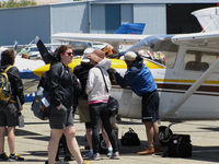 Buchanan Field Airport (CCR) - 2014 Air Race Classic judges, pilots and ground crews checking out a new arrival for the race @ Buchanan Field, Concord, CA - by Steve Nation