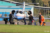 Dundee Airport, Dundee, Scotland United Kingdom (EGPN) - Groundcrew retrieve chocks whilst passengers and crew load onto a visiting LJ31A at Dundee Riverside Airport EGPN - by Clive Pattle
