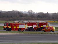 Manchester Airport, Manchester, England United Kingdom (EGCC) - some of airport fire service on standby, - by Jez-UK