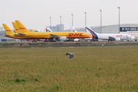 Leipzig/Halle Airport, Leipzig/Halle Germany (EDDP) - Crane passes plane(s) at apron 2.... - by Holger Zengler