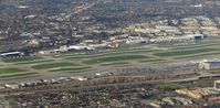 Norman Y. Mineta San Jose International Airport (SJC) - An overview of the Jet Centers at San Jose International Airport, San Jose, CA on Super Bowl 50 Sunday located at nearby Santa Clara, CA.  - by Chris Leipelt