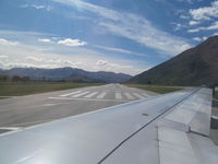 Queenstown Airport - view along runway - by magnaman