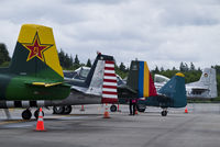 Snohomish County (paine Fld) Airport (PAE) - Lineup of various aircraft belonging to members of the Cascade Warbirds at the 2016 Paine Field General Aviation Day. - by Eric Olsen