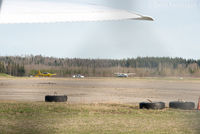 Prince George Airport - South end of airport - private craft and a porsche. - by Remi Farvacque