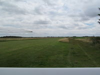 RAF Lakenheath - Mitchells Farm strip near Lakenheath - view over fuselage of G-LSCM - windsock on right - by magnaman