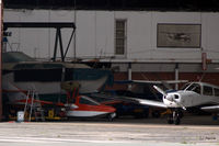 Blackpool International Airport - Peek inside Hangar 2 on northside at Blackpool EGNH - On left can be seen rare Pereira Osprey II G-BVGI seaplane - by Clive Pattle